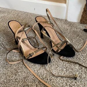 Brand new Black and gold heels